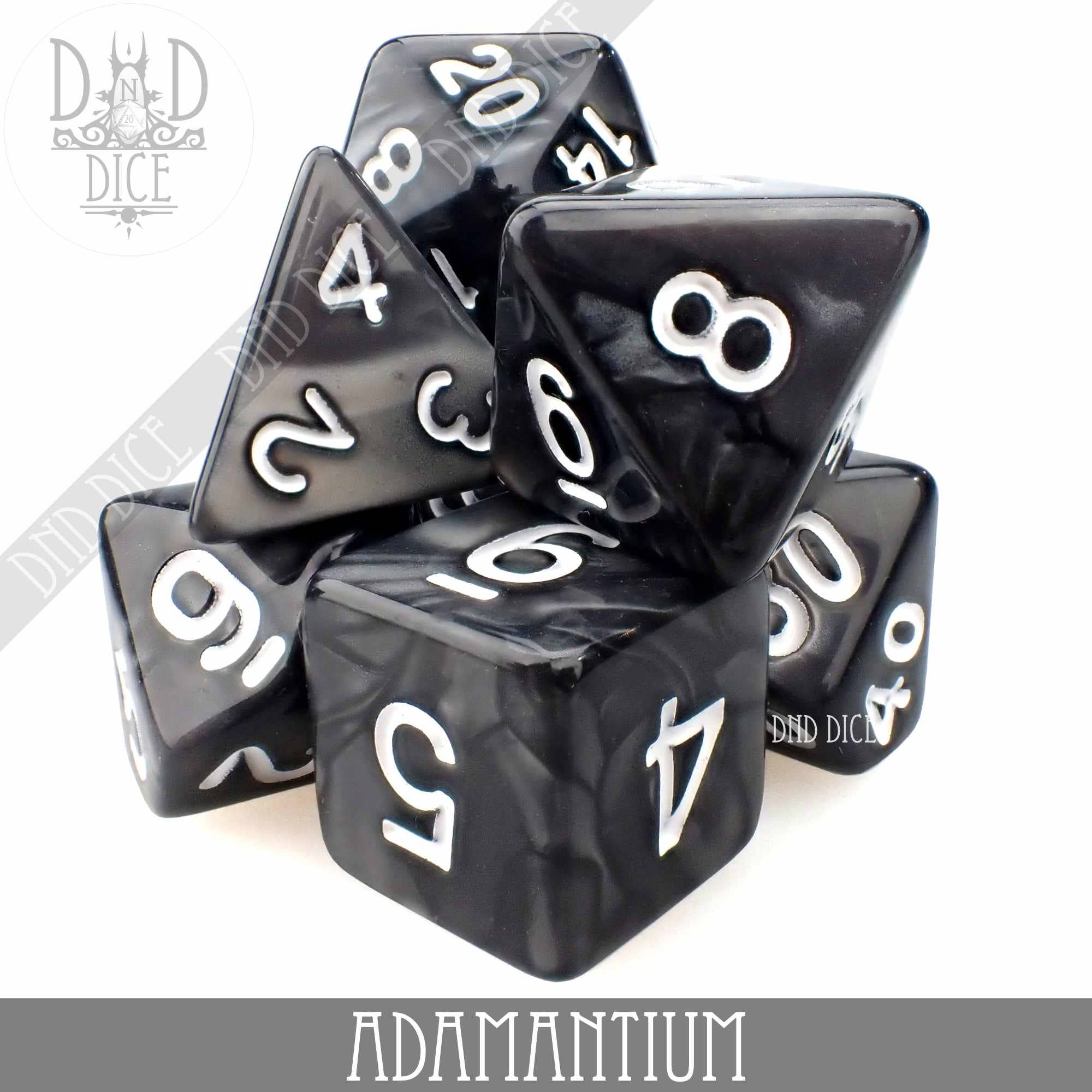 Black marbled acrylic dice with white numbers, labeled Adamantium 7 or 11.