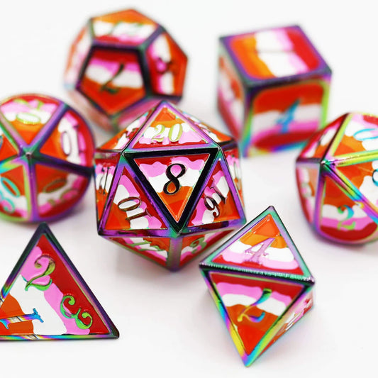 Community Lesbian Pride Flag RPG metal dice set with orange, pink, and white abstract patterns on a white surface.