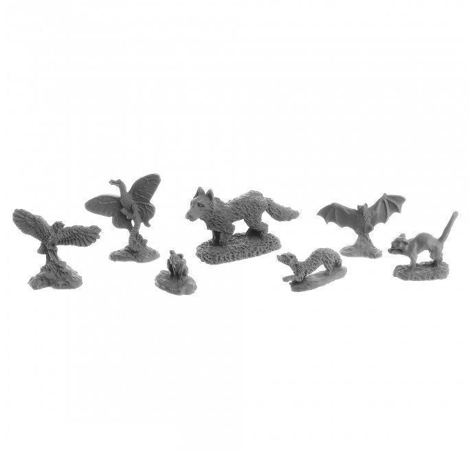 Dungeon Dwellers: Familiars Miniatures set with seven small gray animals—wolf, bat, bird, butterfly, cat, frog, and seal.