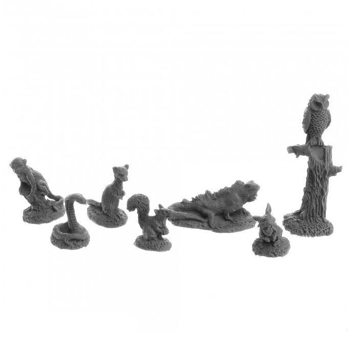 Seven gray Dungeon Dwellers: Familiars Miniatures—monkey, snake, bear, horse, lion, rabbit, and owl on tree.
