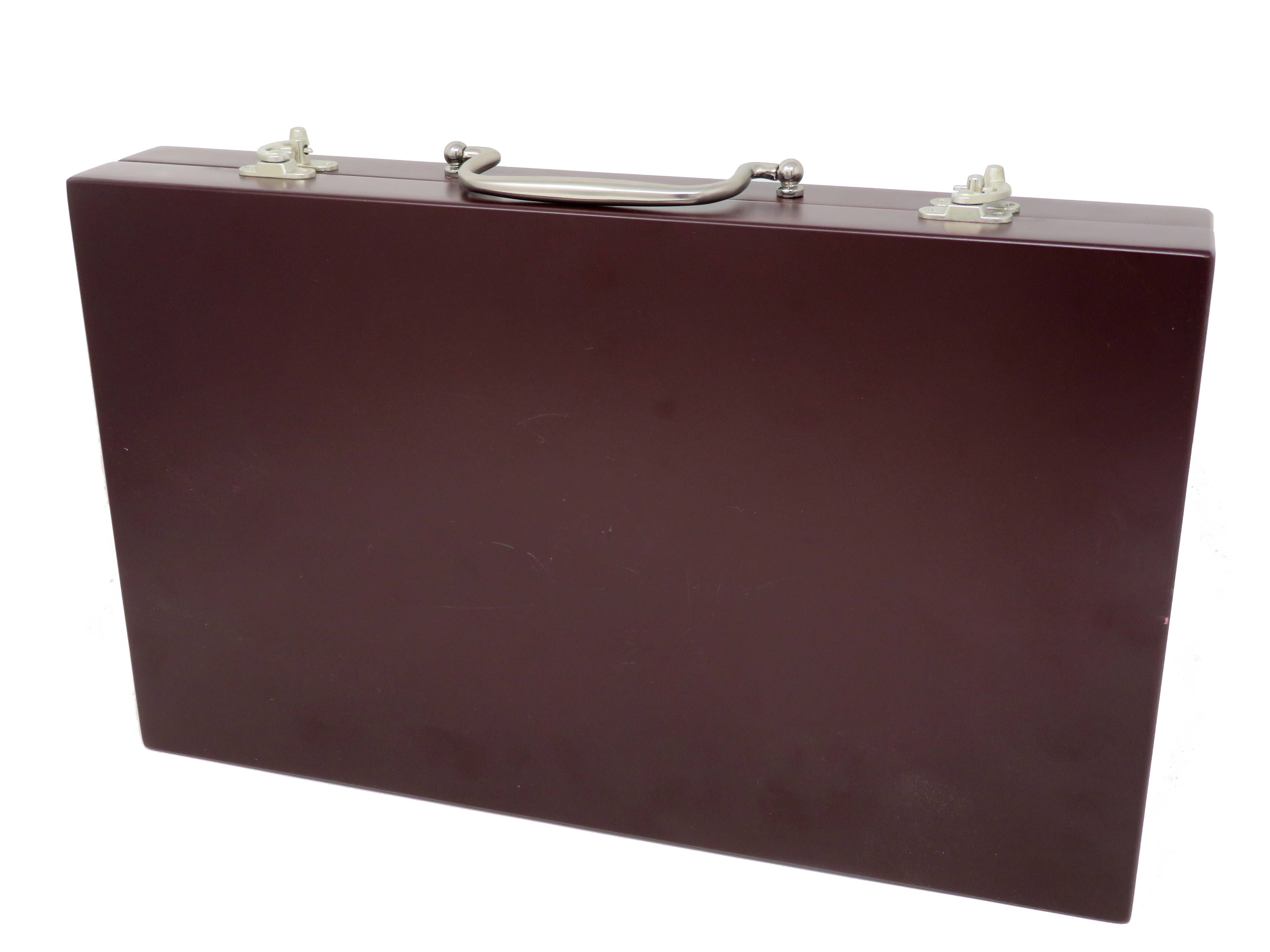 Closed Cork Backgammon briefcase with silver handle and locks, upright.
