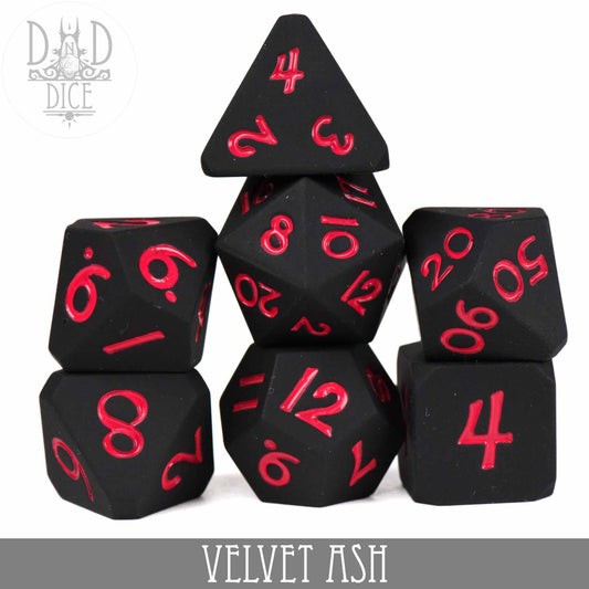 Velvet Ash (Silicone) black silicone dice with red numbers arranged in a pyramid.