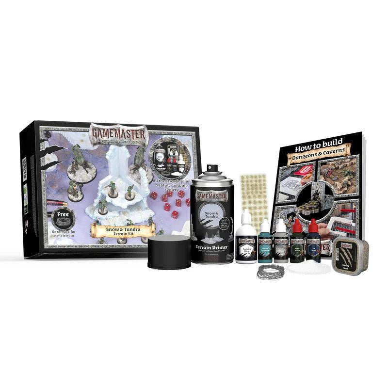 GameMaster Terrain Kit Snow & Tundra with paints, primer spray, brushes, dice, and guidebook for RPG scenery.