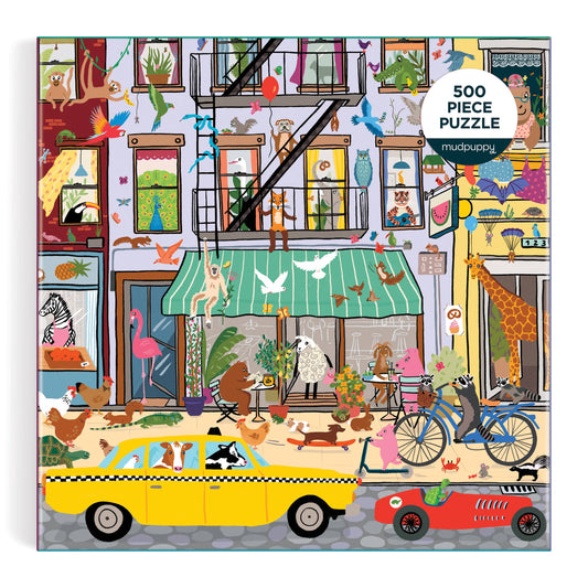 Critter City 500 Piece Family Puzzle featuring animals in a city street with buildings, vehicles, and outdoor scenes.