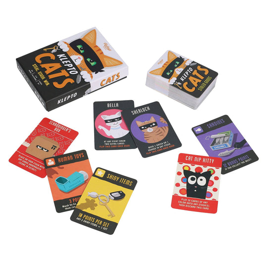 Klepto Cats card game set with cards featuring cat burglars and various loot items displayed.