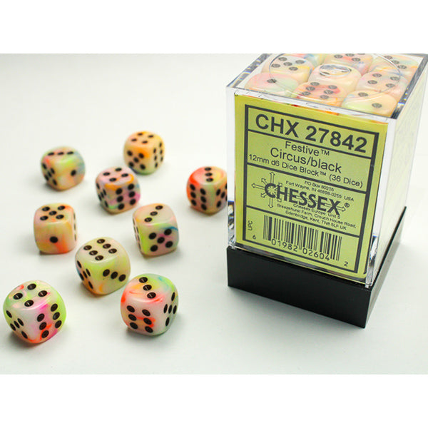 Festive Circus/Black 36d6 dice in a clear container with colorful 12mm dice blocks nearby.