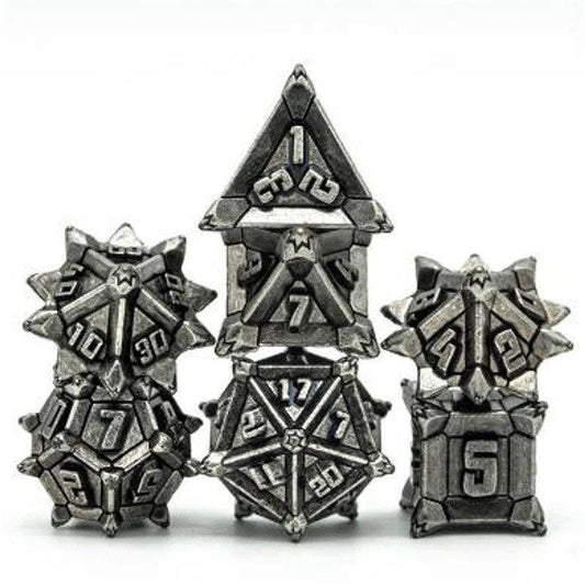 Ancient Silver Flail RPG Metal Dice Set with five metallic dice in a fantasy spiked armor design.
