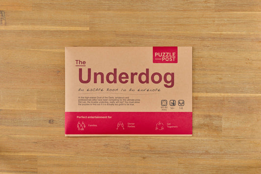 Brown envelope labeled Escape Room | Puzzle Game | Board Game | The Underdog.