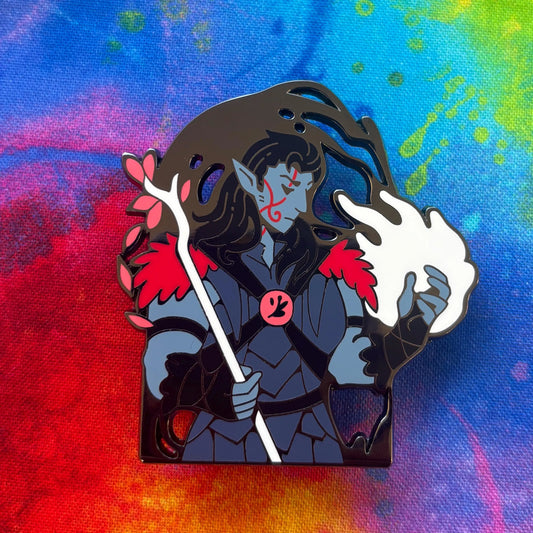 Halsin Pin showing a blue-skinned fantasy character with red markings, staff, and white flame.