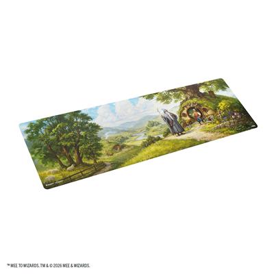 The Hobbit Prime 8ft Playmat featuring a wizard and hobbits at a round door with hills, trees, and mountains.