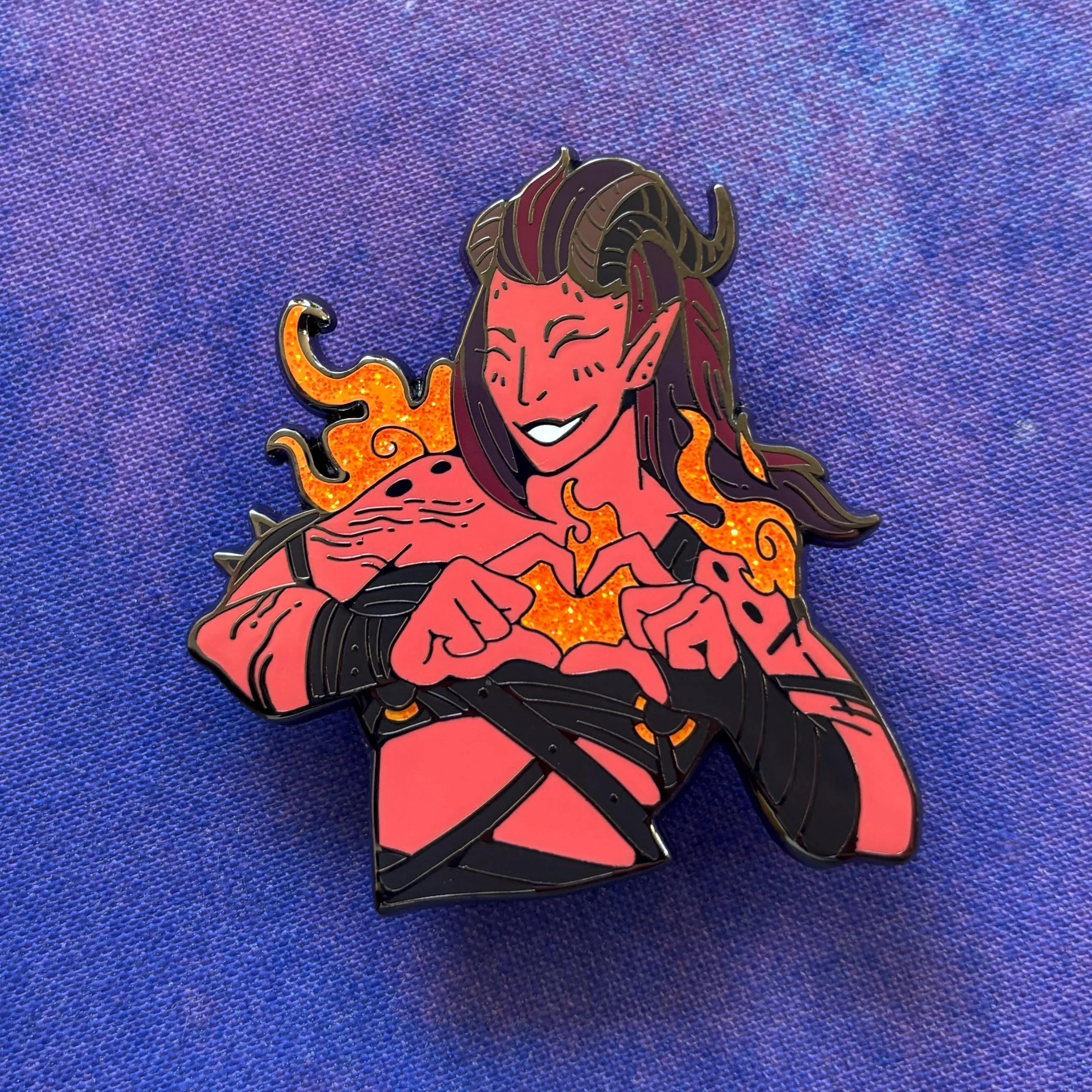 Karlach Pin featuring a horned character forming a heart with hands and swirling flames in the background.