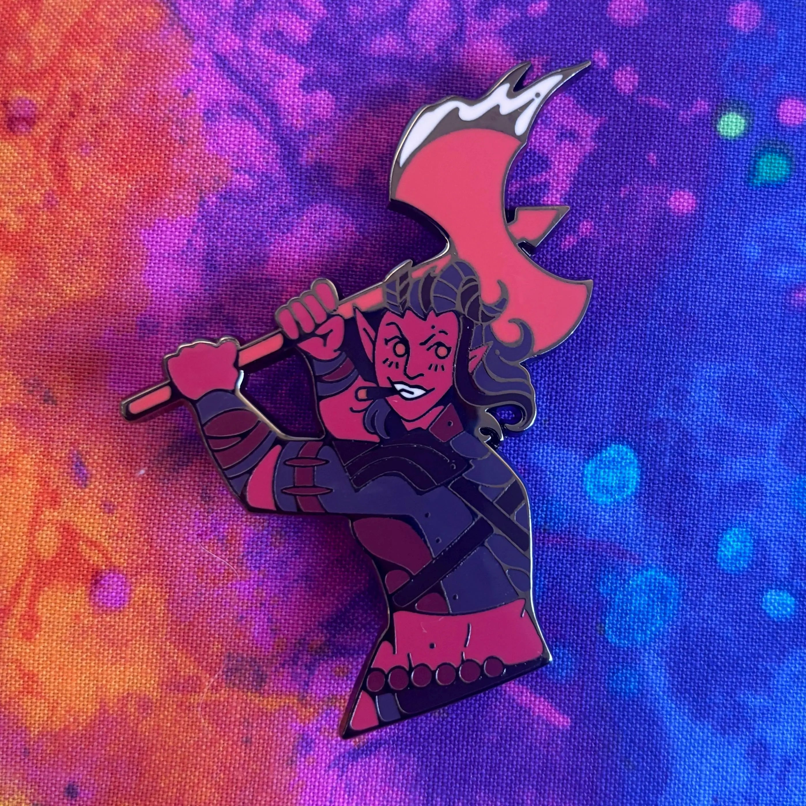 Karlach Dual Destinies Pin featuring a cartoon warrior holding a red axe on a blue, pink, and orange background.