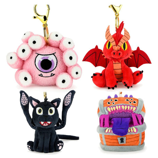 Magic The Gathering 3” Plush Charms W1: one-eyed pink monster, red dragon, black cat, and treasure chest variants.