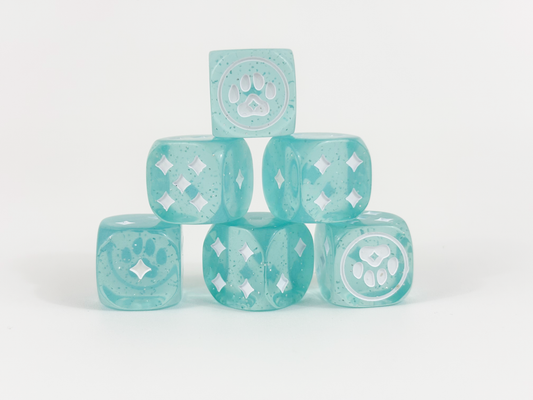Six teal 20mm dice from the Magical Kitties Save the Day Kitty Paw Dice Set stacked in a pyramid.