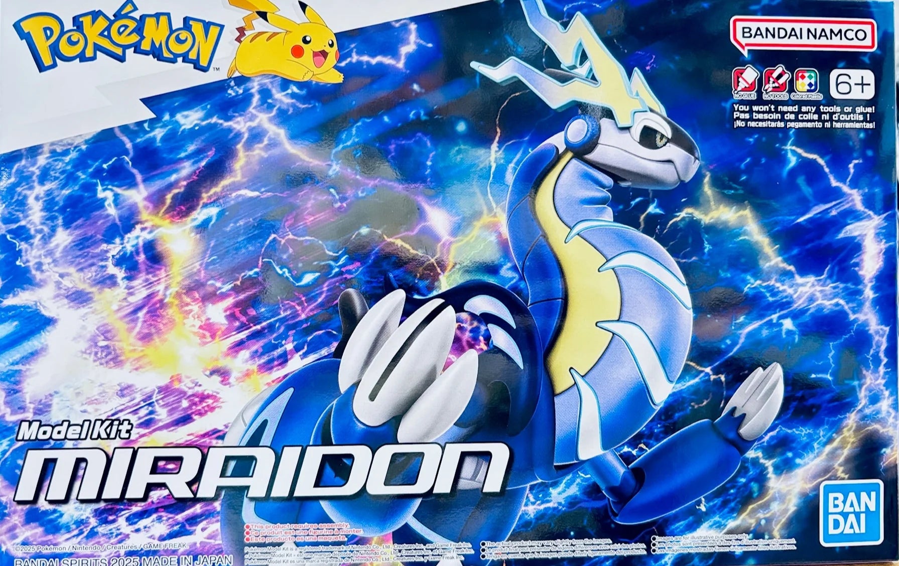 Pokemon Model Kit Miraidon box featuring the blue and yellow dragon Pokémon.