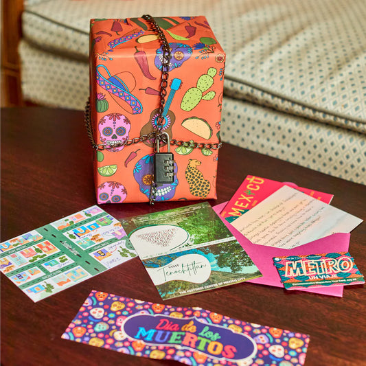 Padlockd Mexico locked box set with papers and cards displayed on a wooden table.