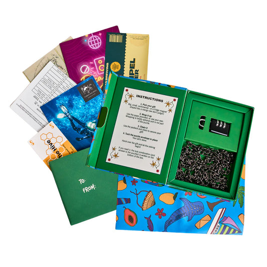 Padlockd The Philippines escape room kit with instructions, envelopes, box, lock, and chain.