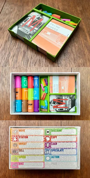 Tokyo Metro Osaka Expansion trays with compartments for action cards, tokens, dice, and labeled player pieces.