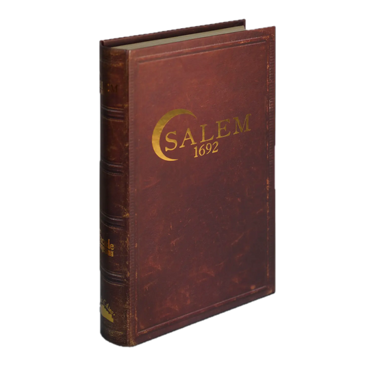 Brown leather-bound Salem 1692 book with gold lettering, inspired by the board game, standing upright.