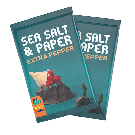 Sea Salt and Paper Extra Pepper game expansion packs with origami sea creatures and effect cards.