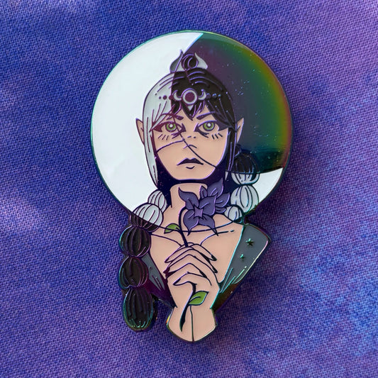 Shadowheart Pin showing a fantasy elf holding a flower and a moon on a purple textured background.