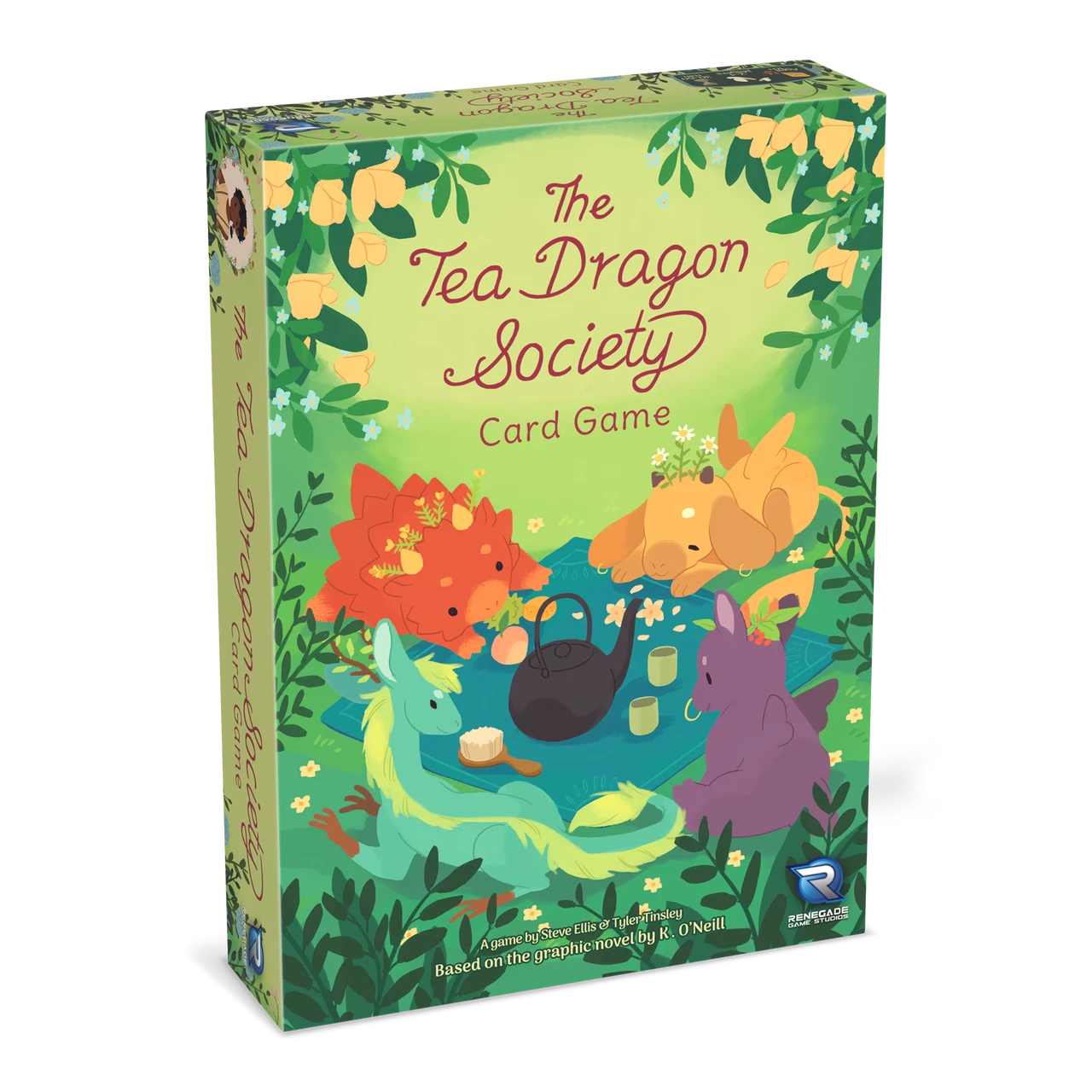 The Tea Dragon Society Card Game box featuring dragons drinking tea in a green garden.