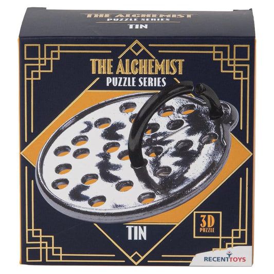 The Alchemist: Tin box with a 3D puzzle showing holes and a black ring.