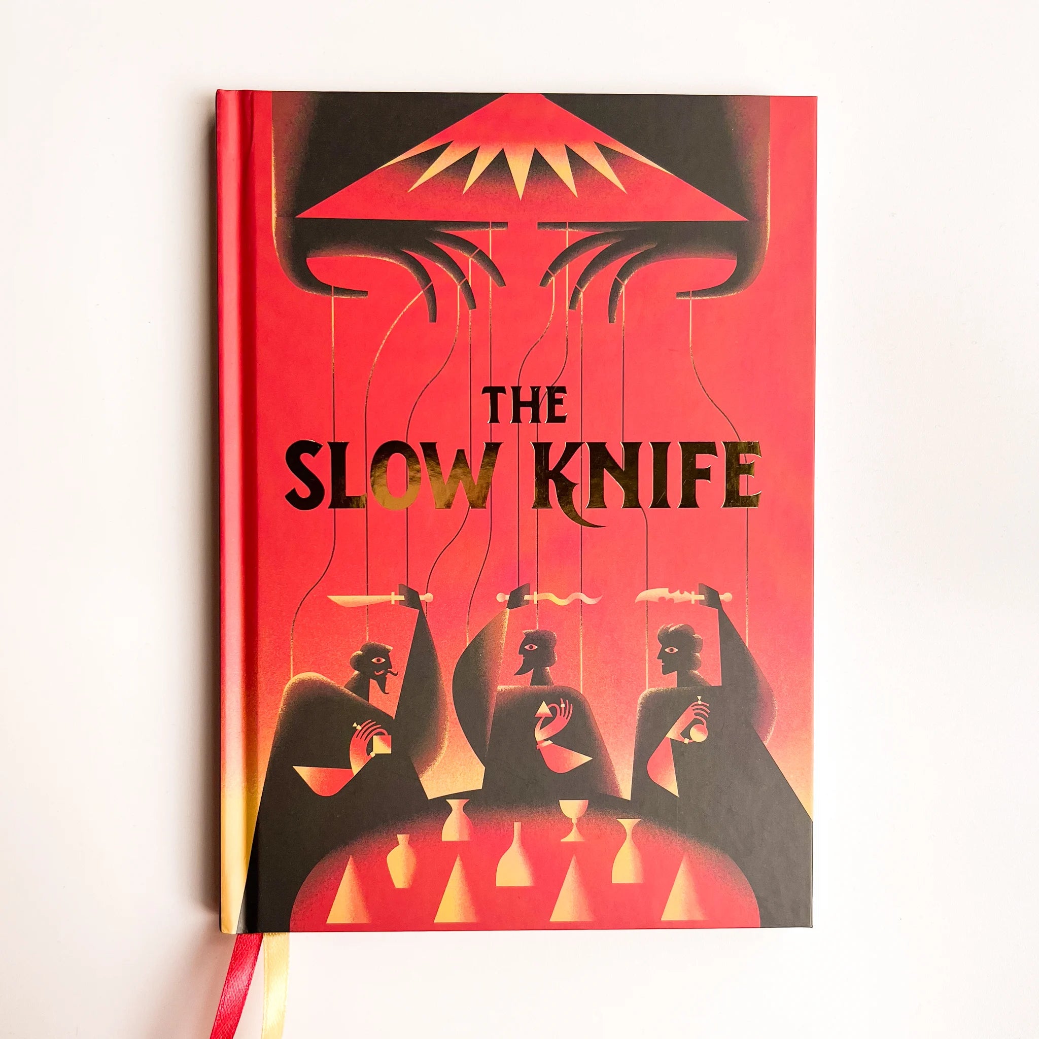 The Slow Knife book cover with stylized figures on a red and black geometric background.