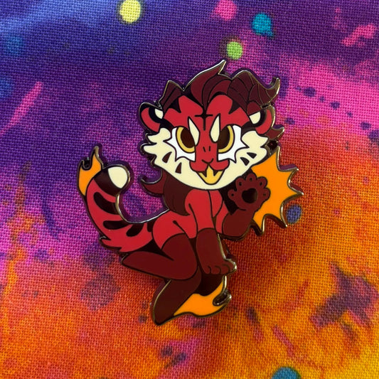 BG3 Cat Companion Pin featuring a fiery red cat with flaming tail and paw.