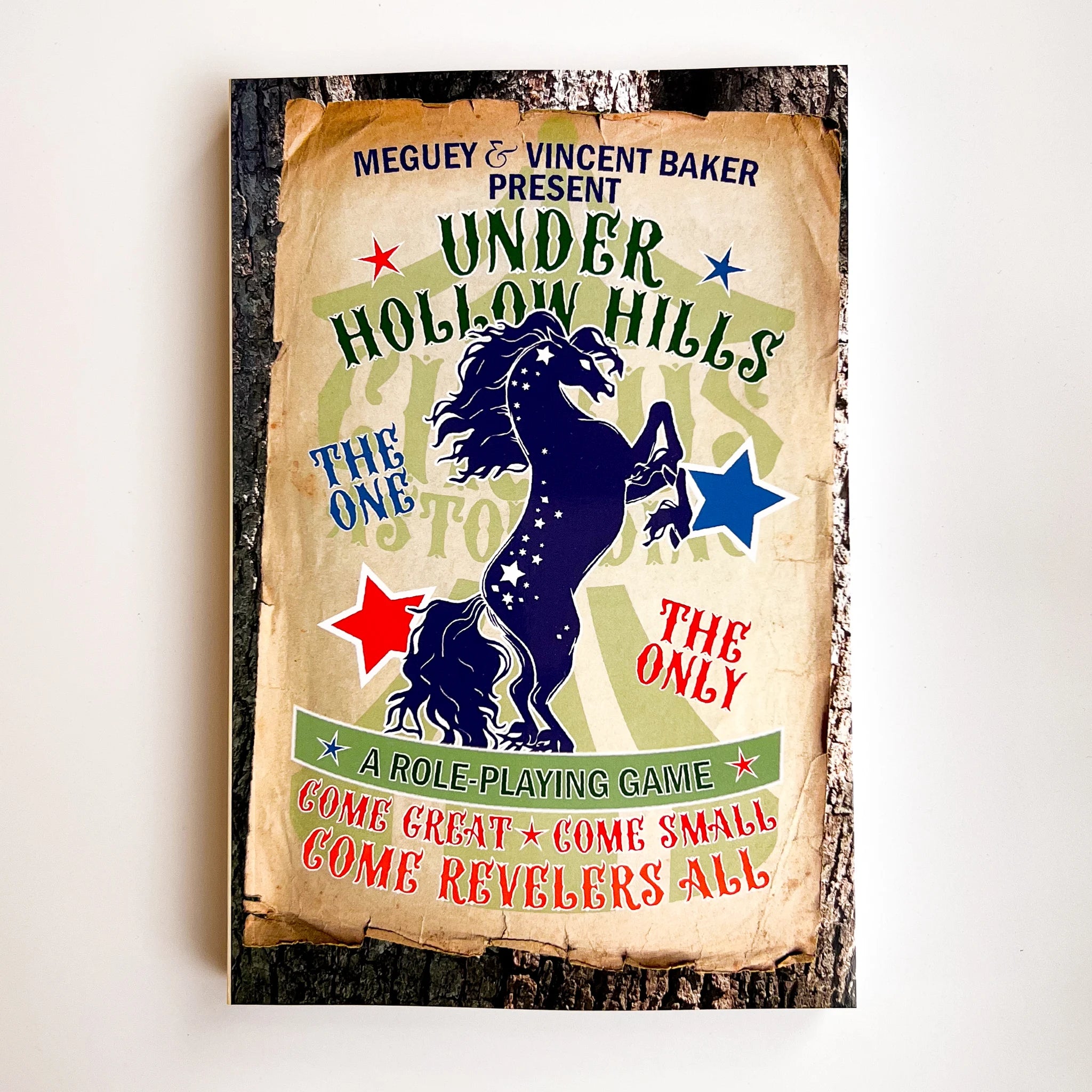 Under Hollow Hills RPG book cover with rearing unicorn, stars, and worn paper design.