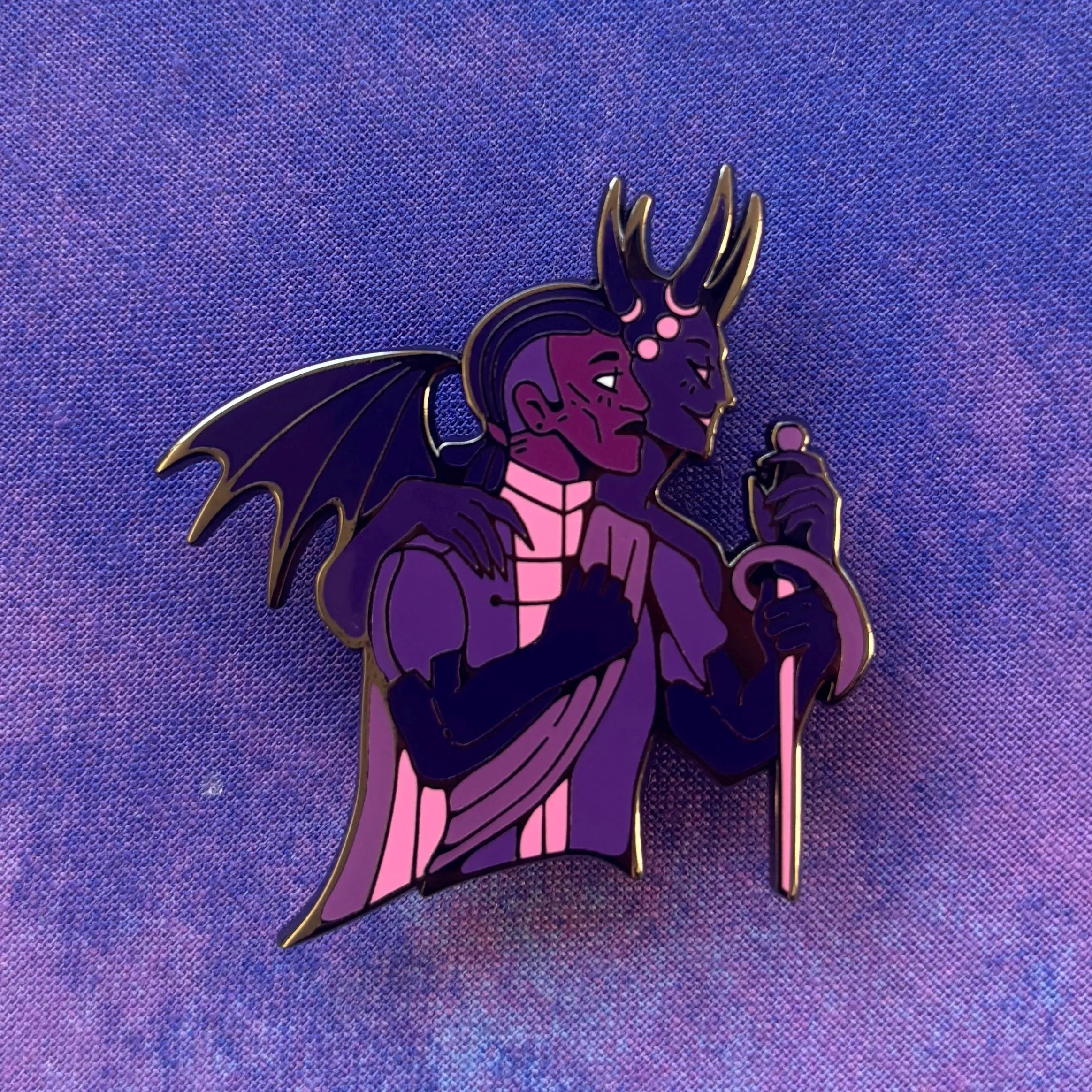 Wyll Dual Destinies Pin: Grand Duke featuring two purple fantasy creatures, one with wings, one holding a staff.